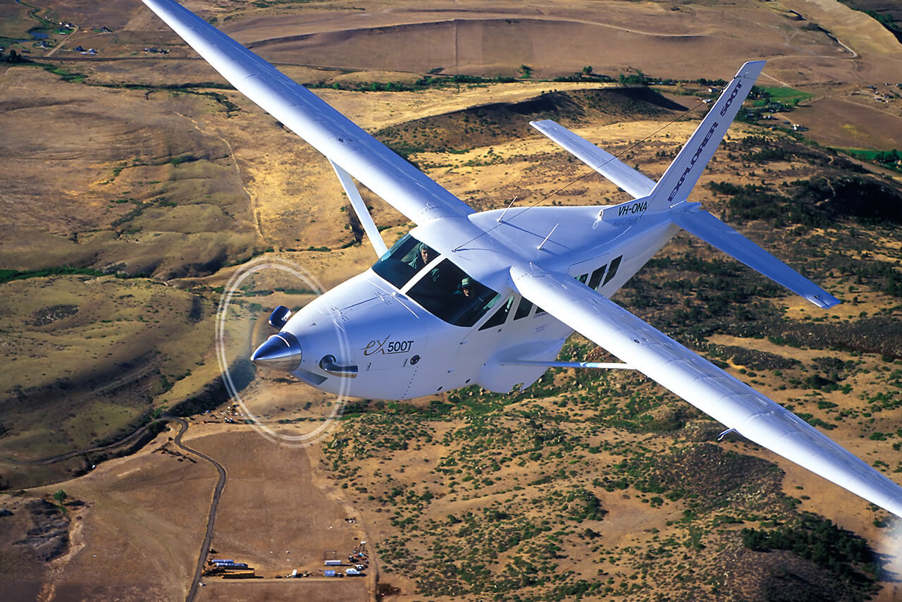Composite utility aircraft flying over land